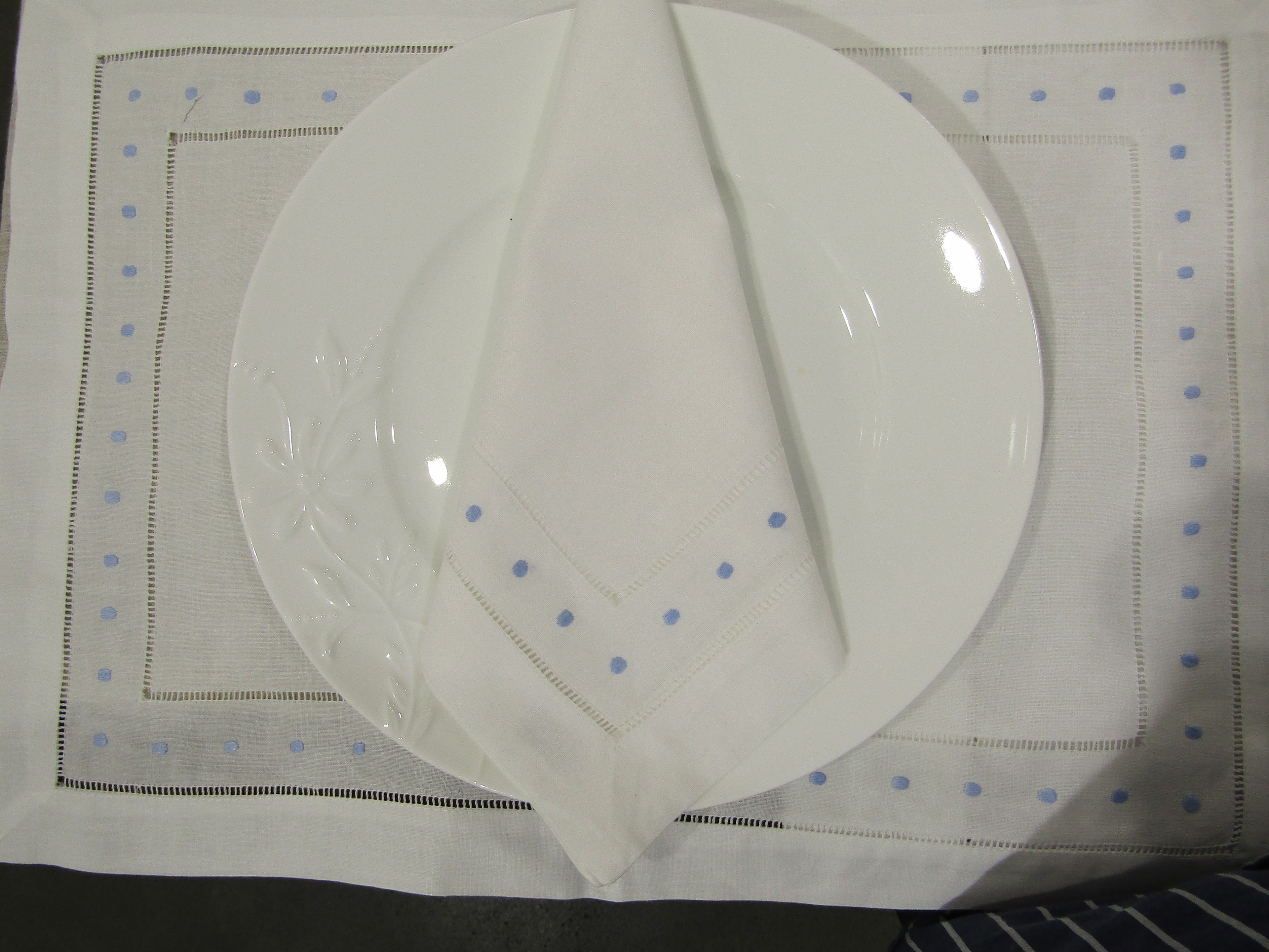 Dinner napkins and placemat with blue swiss dots hemstitch border